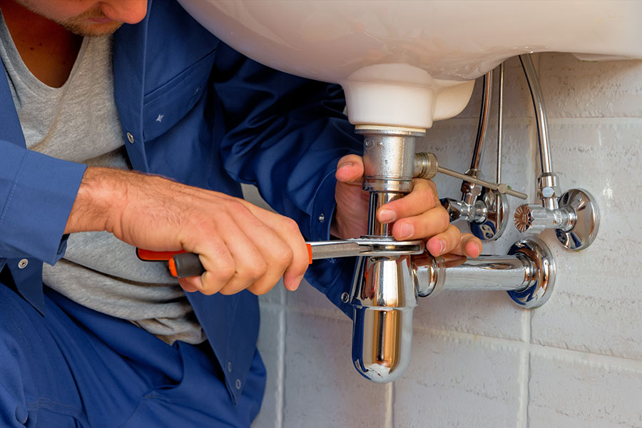 plumber woodford