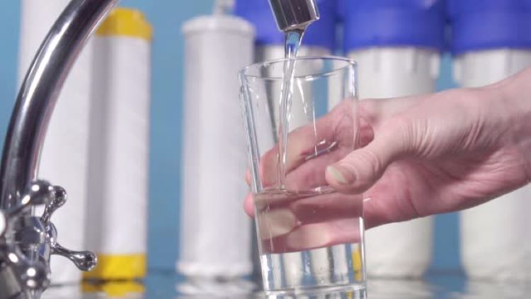 water filter installation pouring fresh water